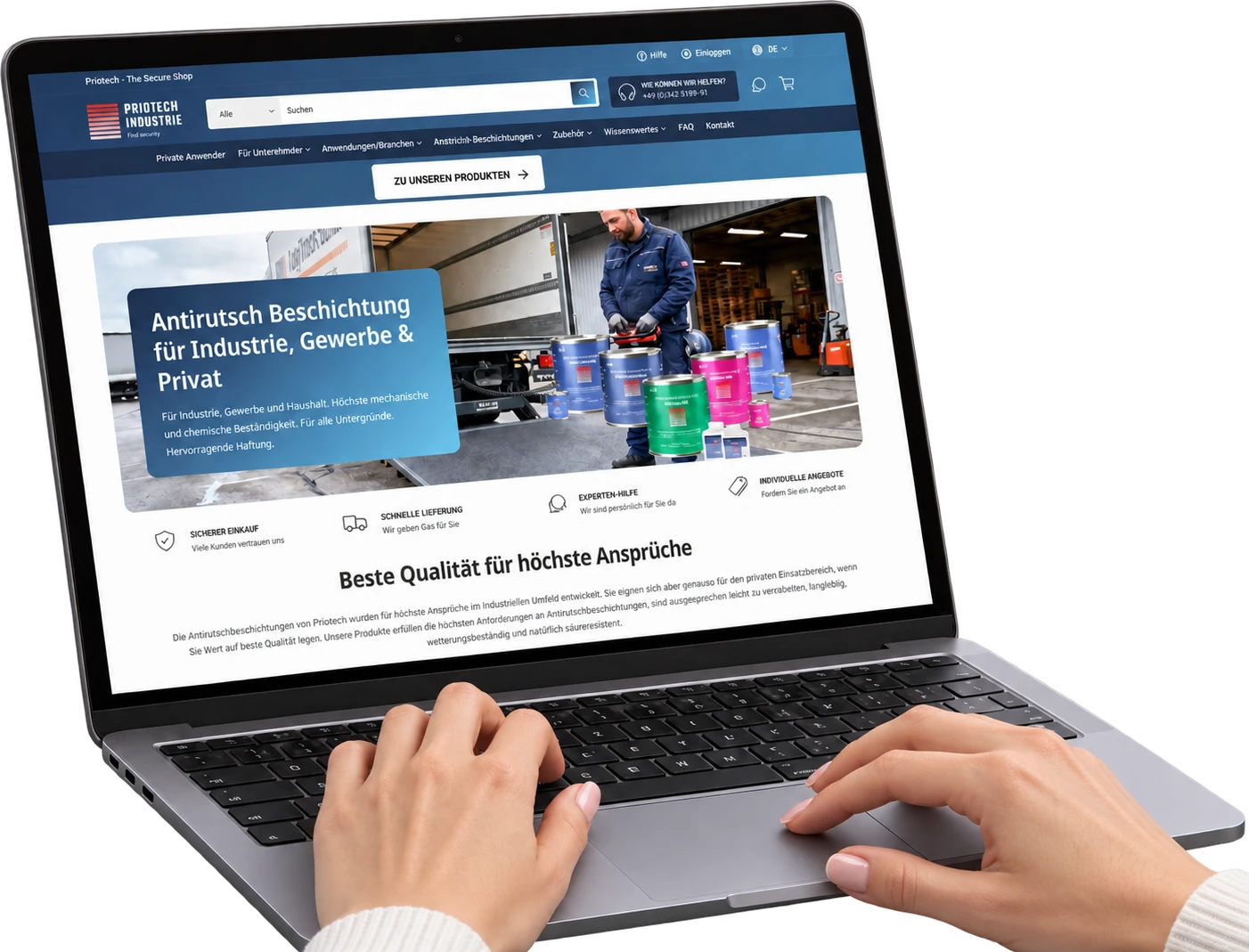 Hände tippen auf einem Laptop mit Online-Shop für Beschichtungsprodukte